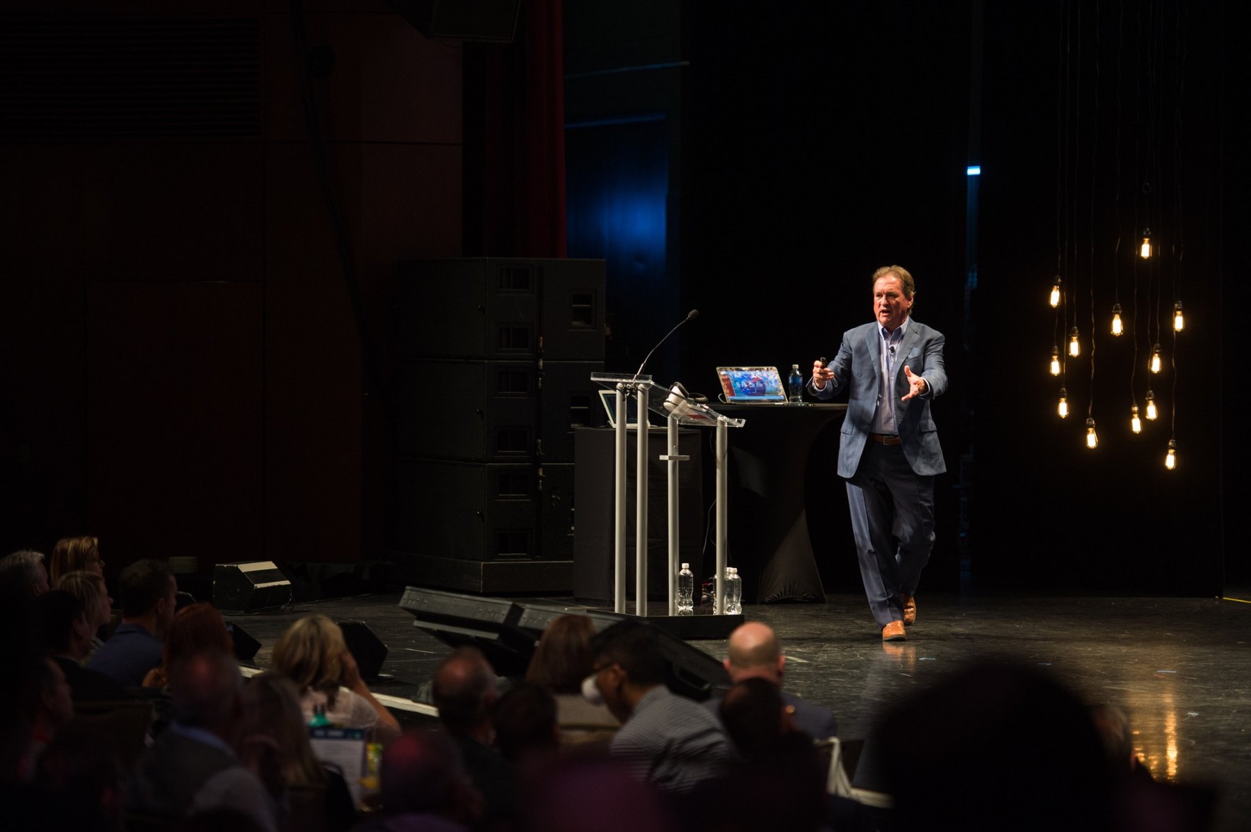 Jim Carroll delivering a keynote on stage
