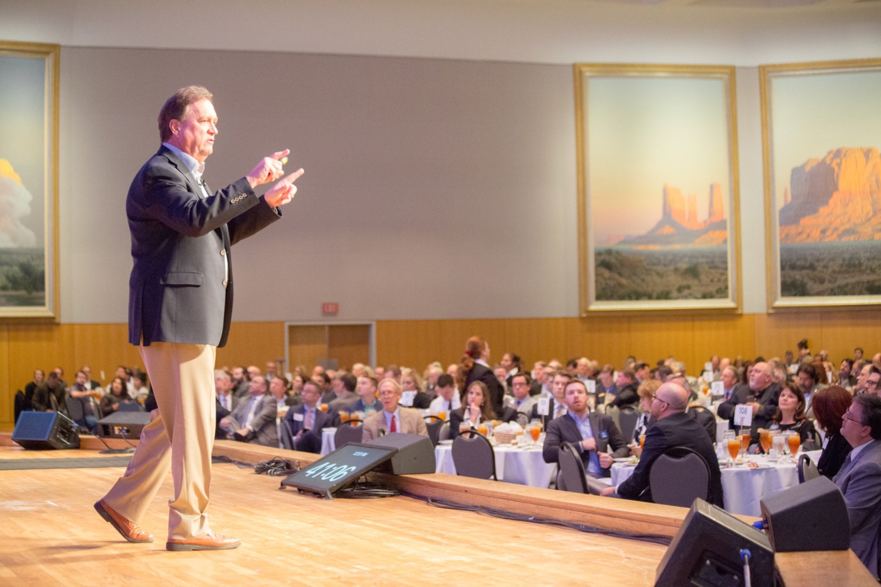 Jim Carroll speaking to a conference audience